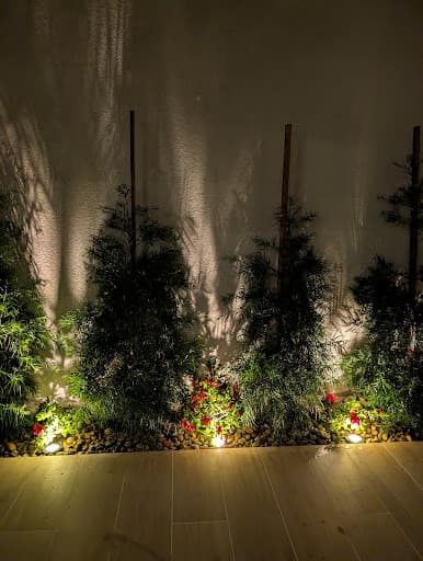 Drainage system installation in a garden bed